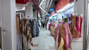 China Town, Singapore - Jul 17 2024: There are different colors of fabric on display at People's Park Centre