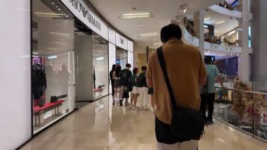 Bukit Bintang, Kuala Lumpur, Malaysia - Dec 14 2024: Group of people are walking at Pavilion shopping complex