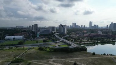Johor Bahru, Johor, Malaysia - May 01 2024: Wide-angle drone shot capturing the scenic suburban roads of southern Johor