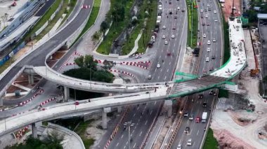 Gelugor, Penang, Malaysia - Dec 02 2024: Busy highway with a bridge in construction