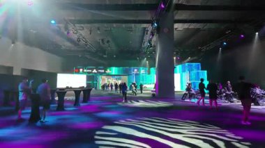 Segambut, Kuala Lumpur, Malaysia - Dec 07 2024: Enthusiastic crowds gather at KLIMS 2024, exploring the latest cutting-edge vehicles on display.