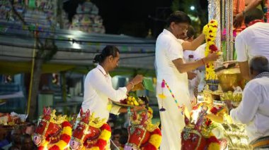 George Town, Penang, Malaysia - Jan 26 2024: Devotees present offerings as part of their vows during Thaipusam.