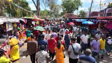 George Town, Penang, Malaysia - Jan 25 2024: Devotee proceeds solemnly, carrying offerings in a Thaipusam religious procession.