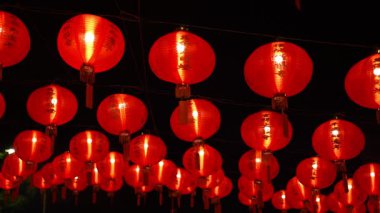 George Town, Penang, Malaysia - Feb 09 2024: A bunch of red lanterns hanging from the ceiling at Goddess of Mercy Temple