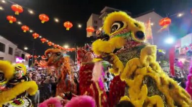George Town, Penang, Malaysia - Feb 09 2024: Festival atmosphere with lion dance at street