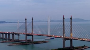 Gelugor, Penang, Malaysia - Dec 02 2024: Aerial Penang Bridge spans sea