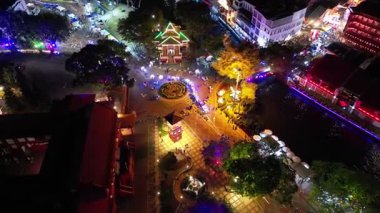 Bandar Hilir, Melaka, Malaysia - Mar 01 2024: Aerial view of Melaka shining with night lights.