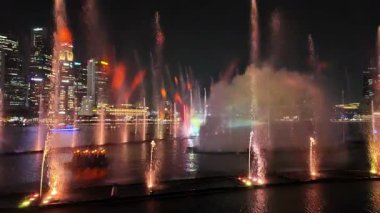 Marina Sand, Singapore - Jul 17 2024: pectra - A Light and Water Show. The fountain is lit up and has lights