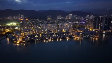 Gelugor, Penang, Malaysia - Dec 02 2024: Aerial town at night with The Light condominium in the background