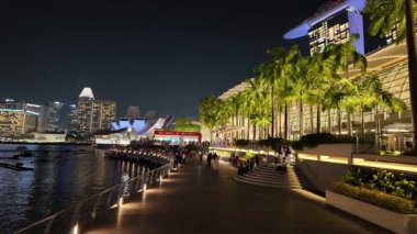 Marina Sand, Singapore - Jul 17 2024: A city street with a large building in the background at Marina Bay Sands