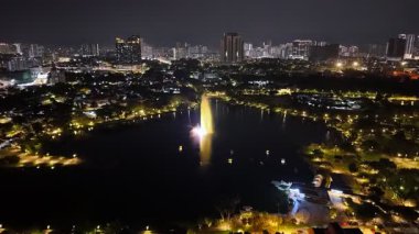 Bukit Bintang, Kuala Lumpur, Malaysia - Dec 15 2024: City at night with a fountain Taman Titiwangsa