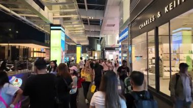 Bukit Bintang, Kuala Lumpur, Malaysia - Jun 15 2024: People are outside of a store. The store is called Charles and Keith