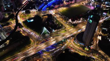 Bukit Bintang, Kuala Lumpur, Malaysia - Jun 17 2024: The street is lit up at night. There are cars on the street