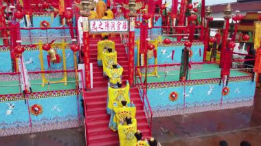 Raja Uda, Penang, Malaysia - Sep 19 2024: A Taoist priest chants sacred verses, guiding the faithful through the celestial rite Tow Boo Keong 50th anniversary