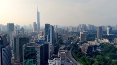Bukit Bintang, Kuala Lumpur, Malaysia - Dec 07 2024: Drone flies over dense urban grids revealing the city endless energy.