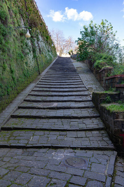 Naples - Italy - February 2, 2023:long stairway connecting the upper and lower part of Naples called Pedamentina