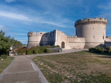 The imposing tramontano castle stands majestically against a clear blue sky, a testament to matera's rich history clipart