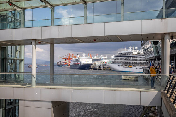 Three Cruise Ships moored at the Cruise Ship dock, Canada Place, Vancouver, British Columbia, Canada on 31 May 2023