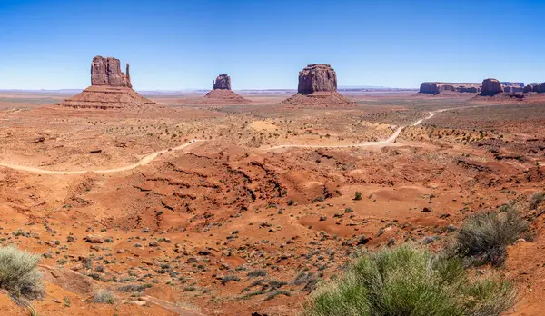stock image Panorama of the Mittens and Merrick Buttes in Monument Valley, Arizona, USA on 21 April 2024