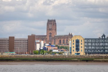 The Anglican Liverpool Cathedral and city skyline seen from the River Mersey, Liverpool, Merseyside, UK on 21 May 2024 clipart
