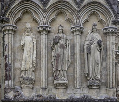 Religious sculptures on the North face of Salisbury Cathedral, Salisbury, Wiltshire, UK on 21 July 2024 clipart