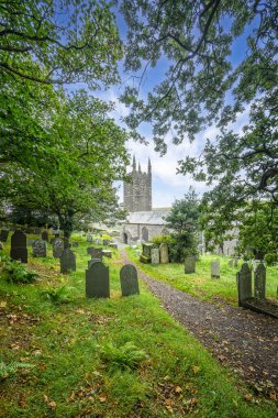 Church of St Morwenna and St John the Baptist and graveyard in Morwenstow, Cornwall, UK on 2 September 2024 clipart