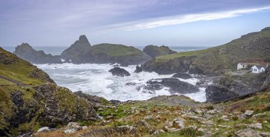 Scenic Kynance Cove on the Lizard Peninsula on a stormy day in Cornwall, UK clipart