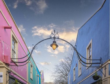 Frome town centre shopping precinct street lamp with Christmas lights in Market Place, Frome, Somerset, UK on 28 November 2024 clipart