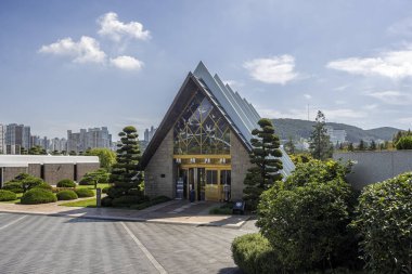 The Information and welcome building at the UN Memorial Cemetery in Busan, Korea on 1 October 2024 clipart