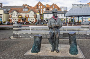 Keşif heykeli Robert Baden Powell 'ın 4 Ekim 2025' te Poole Harbour, Dorset, İngiltere 'deki rıhtımın kurucusu.