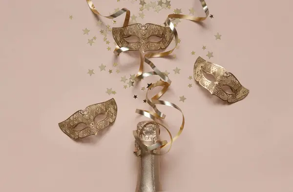Festive Background Champagne Bottle Carnival Masks Streamers Serpentine Golden Glitter — Stock Photo, Image