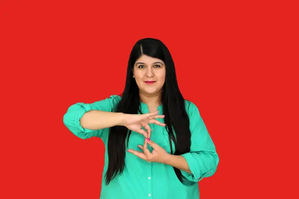 stock image 30-year-old Latina adult woman shows Mexican sign language used by deaf people in Mexico