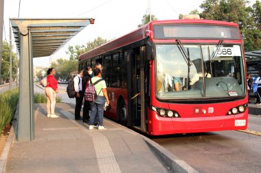 Mexico City, Mexico - Apr 24 2024: The Metrobus is an electric rapid transit bus system that does not pollute and has an exclusive lane clipart