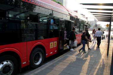 Mexico City, Mexico - Apr 24 2024: The Metrobus is an electric rapid transit bus system that does not pollute and has an exclusive lane clipart