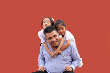 Divorced single dad plays with his two brunette Latina daughters show their love and celebrate Father's Day