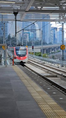 Mexico City, Mexico - Jan 8 2025: Insurgente Train is an interurban transport that connects Santa Fe in CDMX with Toluca, part of the Mexican mobility system clipart