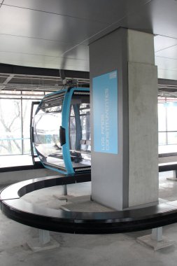 Mexico City, Mexico - Jan 8 2025: Los Pinos Constituyentes Station of Line 3 of the Cablebus with cabins that improve the mobility of CDMX clipart