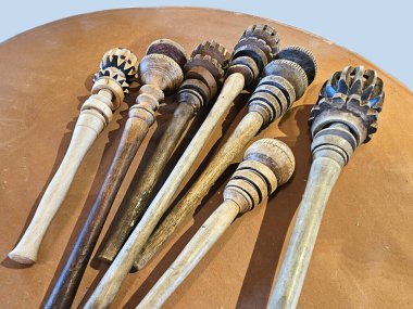 The molinillo, whisk or frother is a traditional utensil of Mexican cuisine made of turned wood and used to prepare hot drinks such as chocolate, atole and champurrado clipart