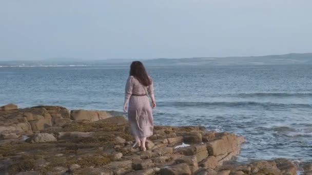 Woman Dress Walks Rocky Seashore Firth Clyde Troon Scotland — стокове відео