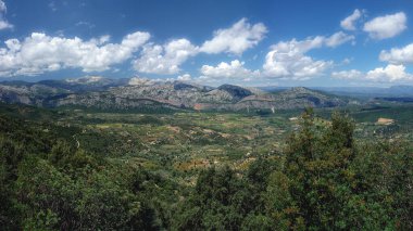 Mountain valley on the east coast of Sardinia on a sunny summer afternoon. Valley of Lanaitto, Italy clipart