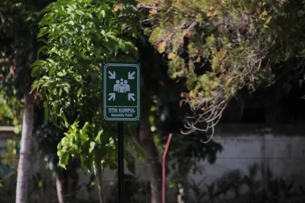 stock image Green Assembly Point Sign in Public Park