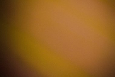 Tahıllı koyu sarı renk gradyan soyut arkaplan, gürültü dokusu efekti