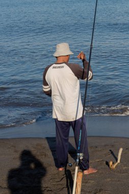 14 Temmuz 2024 'te Loang Baloq köyünde balık tutan insanların portresi - Lombok, Endonezya