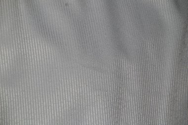 İnce dikey ringa kemiği dokusu arkaplanını gösteren açık gri tekstil ayrıntılı görünümü