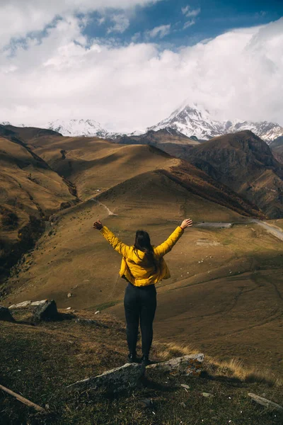 Rear View Young Woman Looks Mount Kazbek Raising Hands Royalty Free Stock Photos