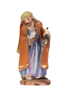 Joseph 'i temsil eden seramik figür. Beyaz arkaplanda izole edilmiş insan seramik figürü
