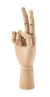 Wooden mannequin hand making peace sign on white background. Gesture.