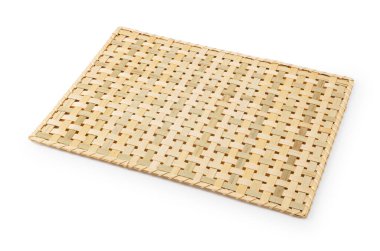 Luncheon mat made of bamboo on a white background. Crafts. Asia.