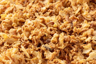 Fried onions spread across the screen. Crispy fried onions. 