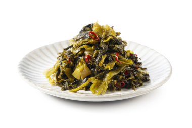 Hardal yeşilliklerinden yapılmış Japon usulü bir turşu.